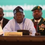 ChairpersonofEconomicCommunityofWestAfricanStatesECOWASandPresidentofNigeriaBolaAhmedTinubureactswhileaddressingtheECOWASheadofstatesandgovernmentinAbuja Beesreign Media
